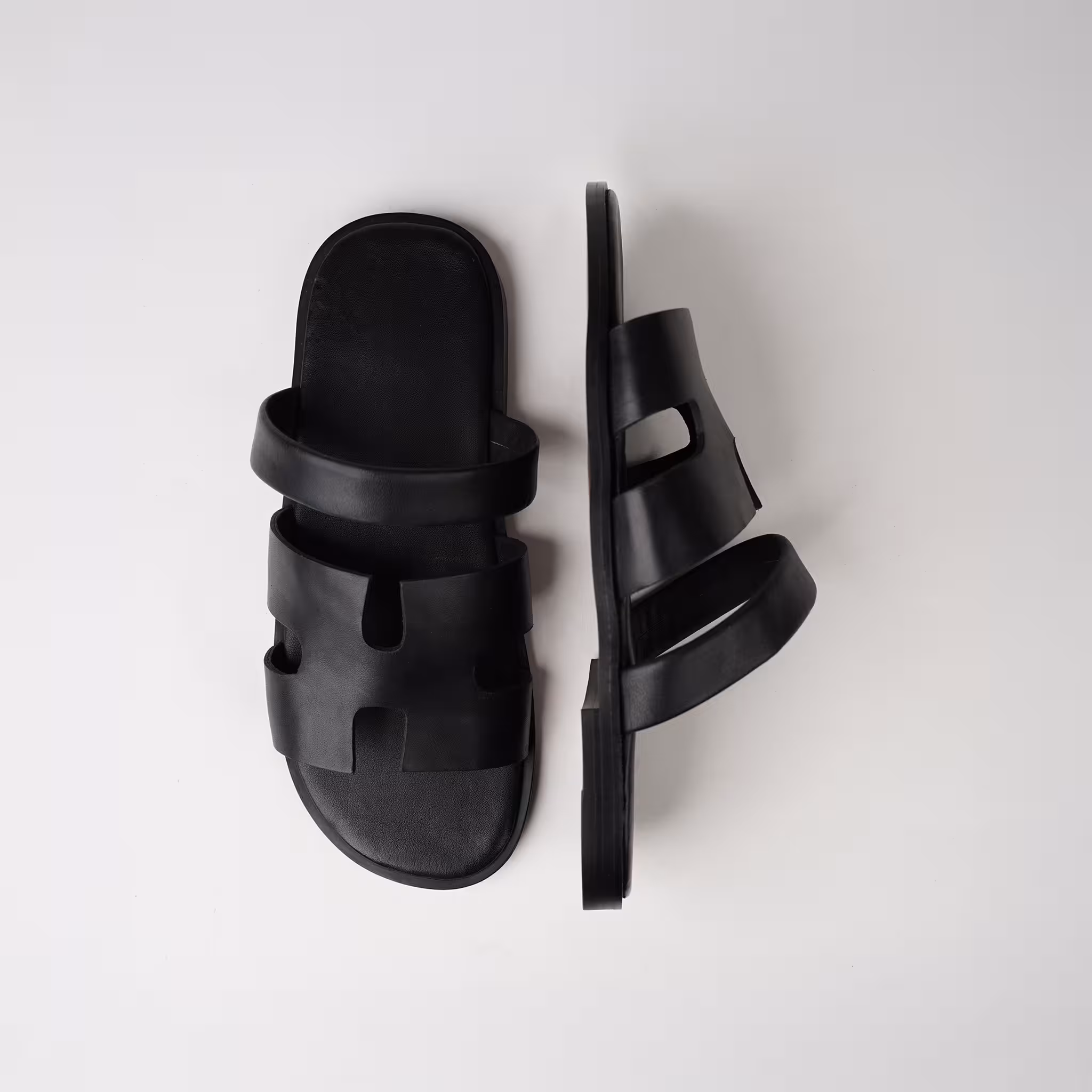 LEATHER SLIDES EMBOSSED WITH H